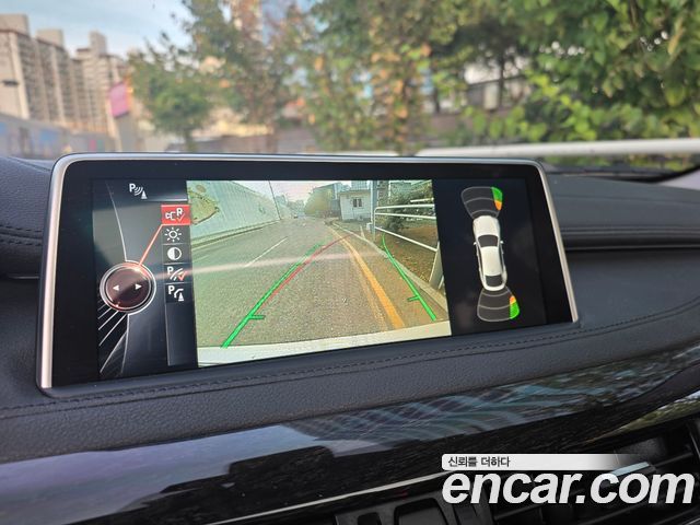 BMW X6 (F16) xDrive 40d 2016 — фото 11
