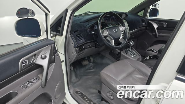 KG Mobility (SsangYong) Korando Turismo 4WD RT 9-seater 2015 — фото 10