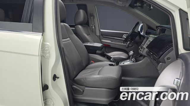 KG Mobility (SsangYong) Korando Turismo 4WD RT 9-seater 2015 — фото 26