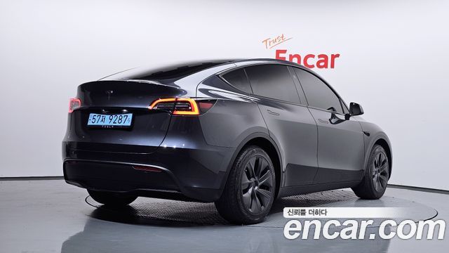 Tesla Model Y RWD 2024 — фото 2