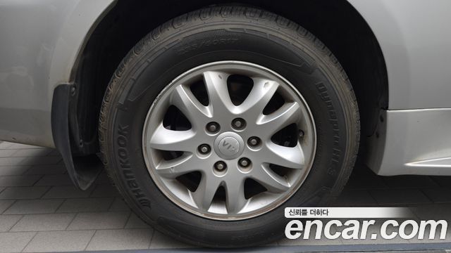 Kia Carnival R Grand Carnival GLX Premium 2012 — фото 5