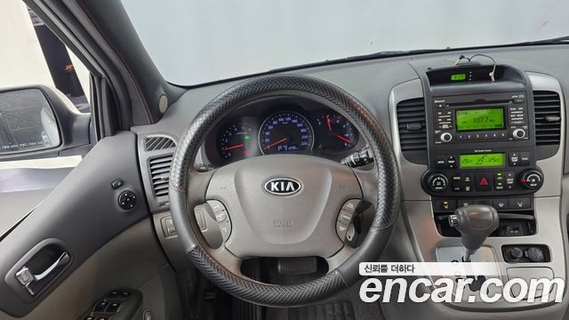 Kia Carnival R Grand Carnival GLX Premium 2012 — фото 13