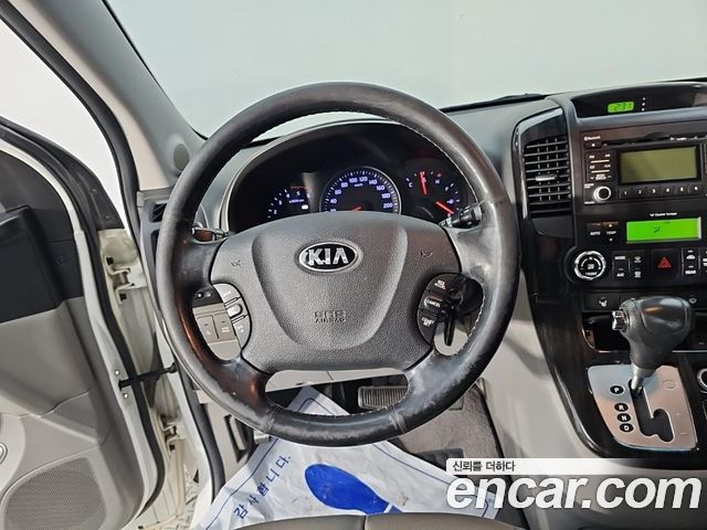 Kia Carnival R New Carnival Limousine GLX High-Deluxe 2014 — фото 9