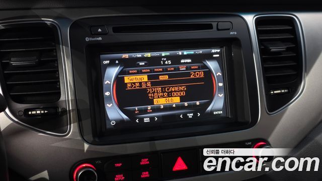 Kia Carens 2.0 LPi Prestige 2015 — фото 27