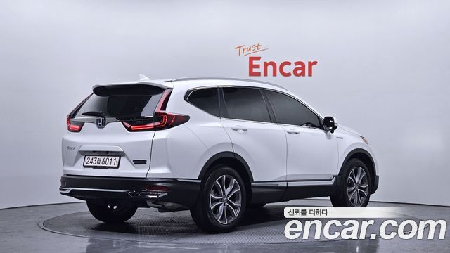 Honda CR-V (V) 2.0 Hybrid Touring 4WD 2022 — фото 2