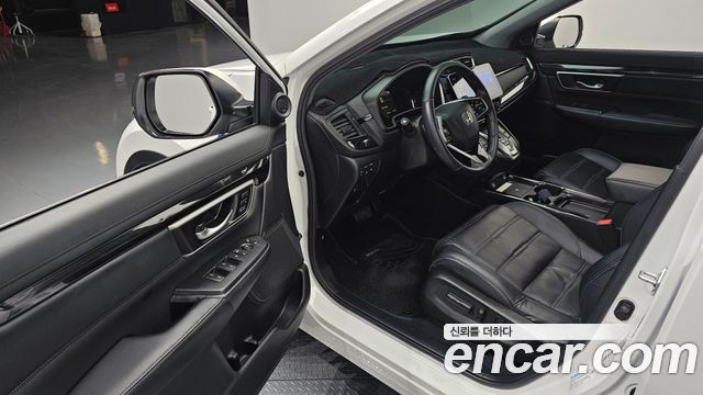 Honda CR-V (V) 2.0 Hybrid Touring 4WD 2022 — фото 11