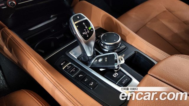 BMW X6 (F16) xDrive 30d 2015 — фото 9