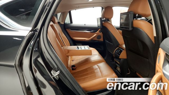 BMW X6 (F16) xDrive 30d 2015 — фото 12