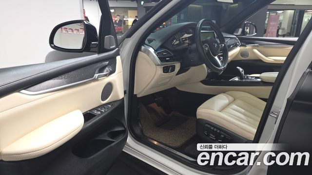 BMW X5 (F15) xDrive M50d 2014 — фото 10