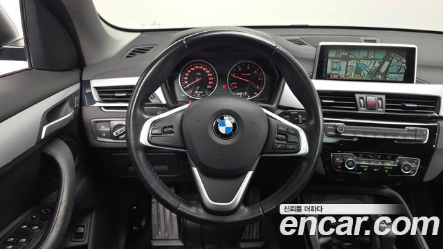 BMW X1 (F48) xDrive 18d 2016 — фото 13