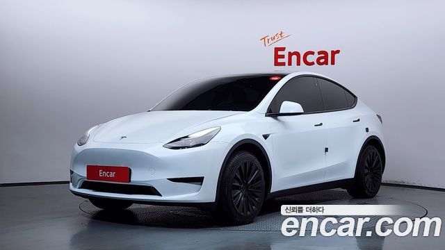 Tesla Model Y RWD 2024 — фото 1