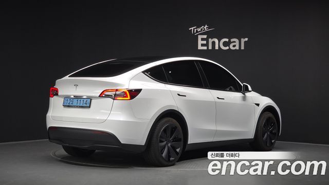 Tesla Model Y RWD 2023 — фото 2