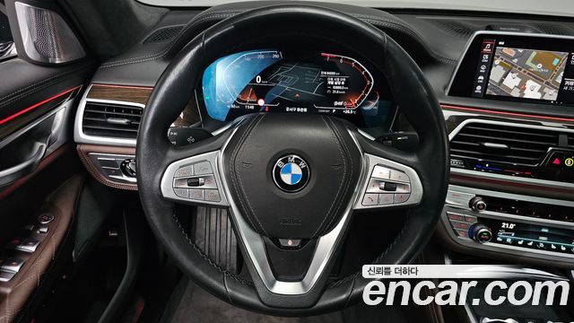 BMW 7 Series (G11) 740Li xDrive Design Pure Excellence 2022 — фото 13