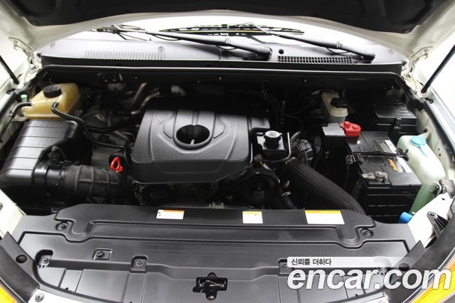 KG Mobility (SsangYong) Korando Turismo 2WD GT 9-seater 2014 — фото 7