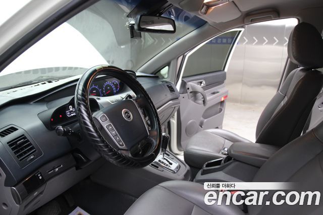 KG Mobility (SsangYong) Korando Turismo 2WD GT 9-seater 2014 — фото 9