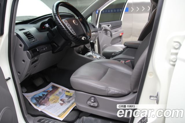 KG Mobility (SsangYong) Korando Turismo 2WD GT 9-seater 2014 — фото 10