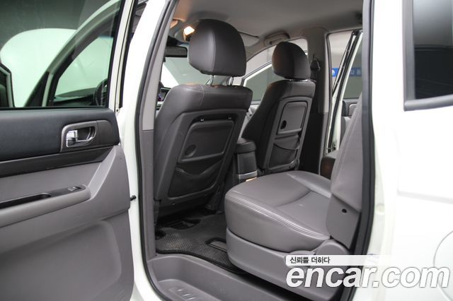 KG Mobility (SsangYong) Korando Turismo 2WD GT 9-seater 2014 — фото 15