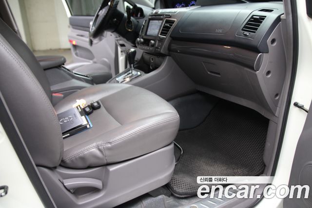 KG Mobility (SsangYong) Korando Turismo 2WD GT 9-seater 2014 — фото 17