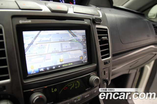 KG Mobility (SsangYong) Korando Turismo 2WD GT 9-seater 2014 — фото 19
