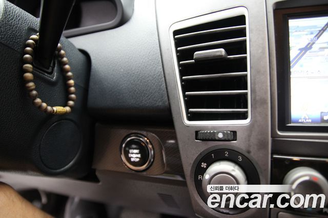 KG Mobility (SsangYong) Korando Turismo 2WD GT 9-seater 2014 — фото 20