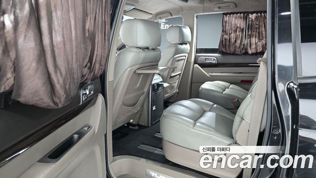 KG Mobility (SsangYong) Korando Turismo 4WD Chateau 9-seater 2015 — фото 15