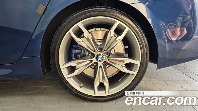 BMW 5 Series (G30) M550i xDrive 2021 — фото 21