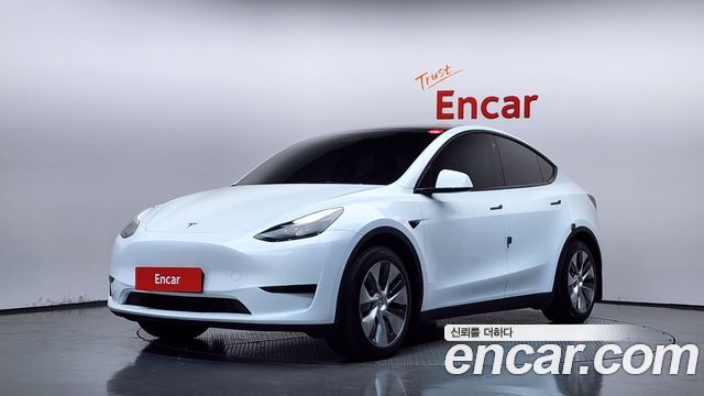 Tesla Model Y RWD 2024 — фото 1