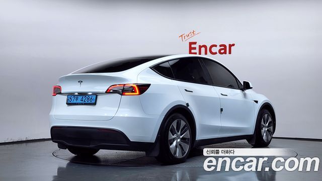 Tesla Model Y RWD 2024 — фото 2