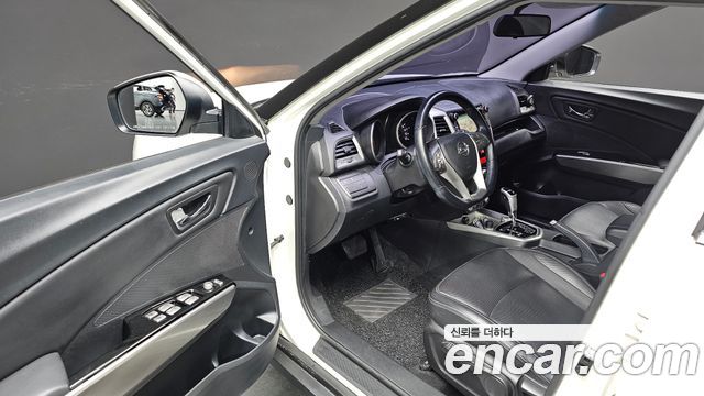 KG Mobility (SsangYong) Tivoli VX 2WD 2015 — фото 12