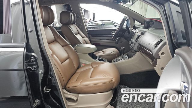 KG Mobility (SsangYong) Korando Turismo 4WD Chateau 9-seater 2015 — фото 11