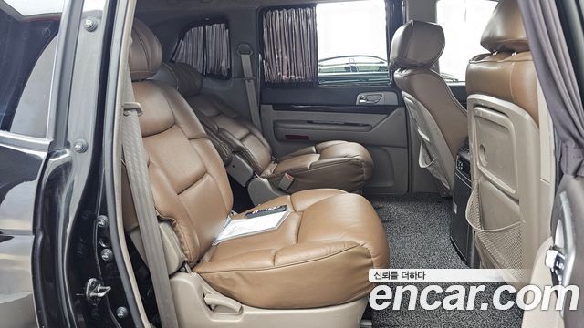 KG Mobility (SsangYong) Korando Turismo 4WD Chateau 9-seater 2015 — фото 12