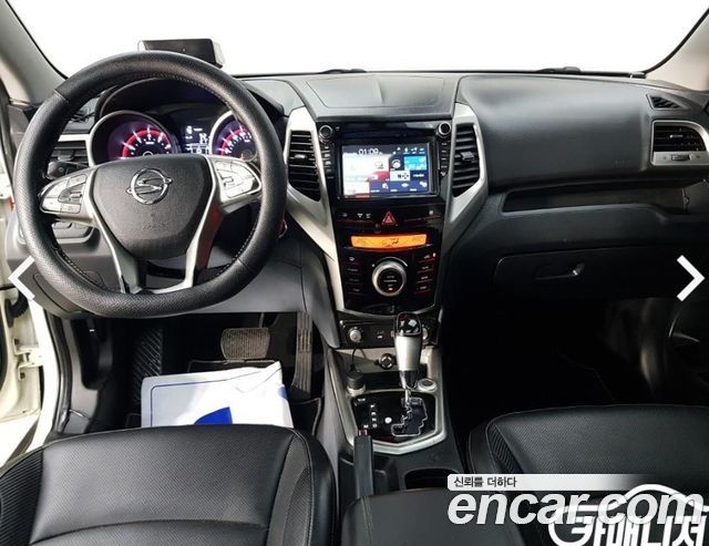 KG Mobility (SsangYong) Tivoli VX 2WD 2015 — фото 7