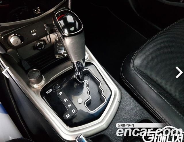 KG Mobility (SsangYong) Tivoli VX 2WD 2015 — фото 9