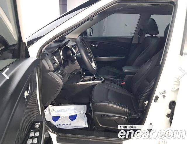 KG Mobility (SsangYong) Tivoli VX 2WD 2015 — фото 16