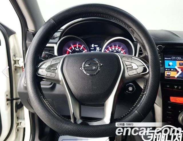KG Mobility (SsangYong) Tivoli VX 2WD 2015 — фото 22
