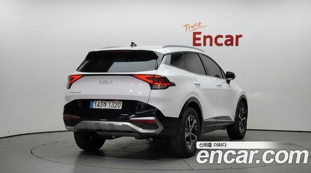 Kia Sportage Hybrid (V) Signature 4WD 2023 — фото 2