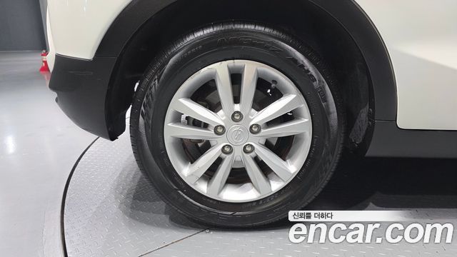 KG Mobility (SsangYong) Tivoli VX 2WD 2015 — фото 5
