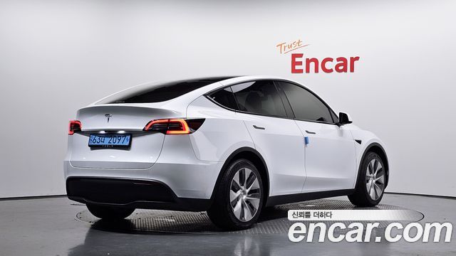Tesla Model Y RWD 2024 — фото 2