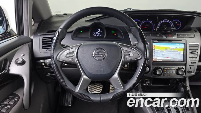 KG Mobility (SsangYong) Korando Turismo 4WD TX 11-seater 2016 — фото 14