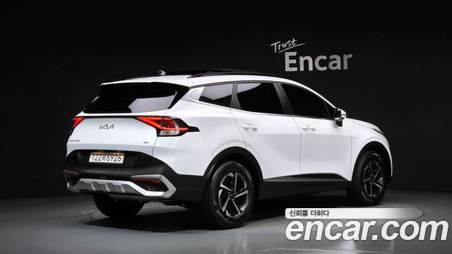 Kia Sportage Hybrid (V) Prestige 2023 — фото 2