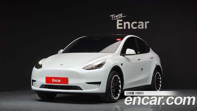 Tesla Model Y RWD 2024 — фото 1