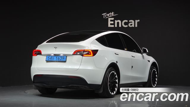 Tesla Model Y RWD 2024 — фото 2