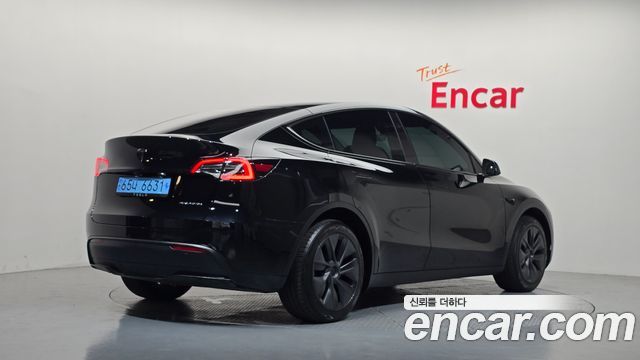 Tesla Model Y Long Range AWD 2024 — фото 2