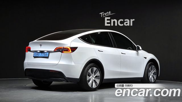 Tesla Model Y RWD 2024 — фото 2