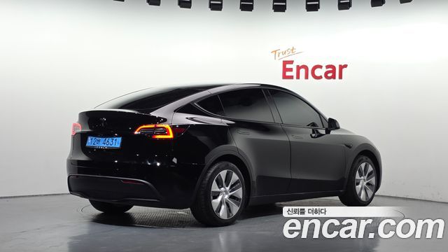 Tesla Model Y Standard Range RWD 2021 — фото 2