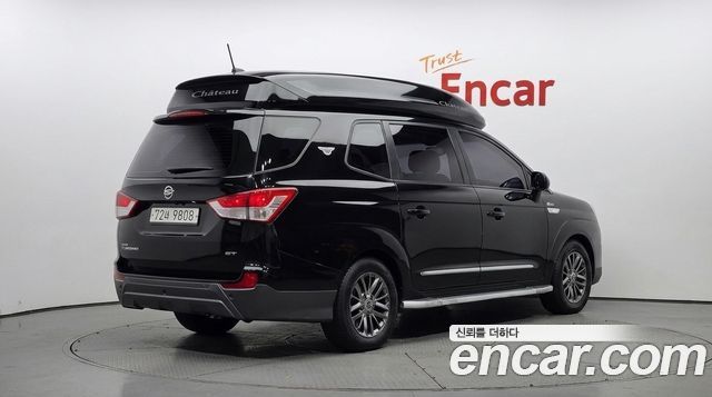 KG Mobility (SsangYong) Korando Turismo 4WD Chateau 11-seater 2014 — фото 2