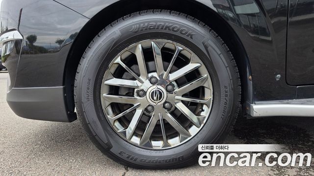 KG Mobility (SsangYong) Korando Turismo 4WD Chateau 11-seater 2014 — фото 5