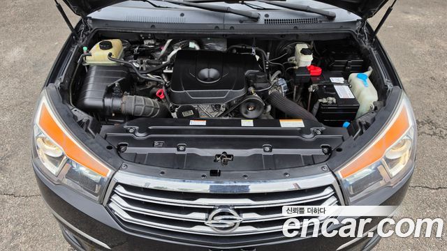 KG Mobility (SsangYong) Korando Turismo 4WD Chateau 11-seater 2014 — фото 6