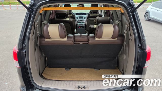 KG Mobility (SsangYong) Korando Turismo 4WD Chateau 11-seater 2014 — фото 13