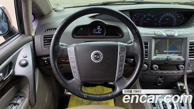 KG Mobility (SsangYong) Korando Turismo 4WD Chateau 11-seater 2014 — фото 14